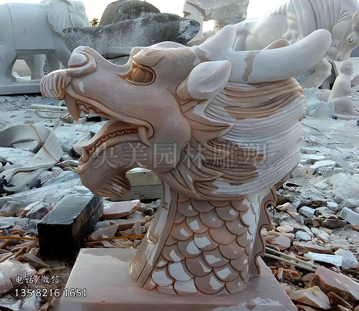 可噴水的晚霞紅石雕龍頭