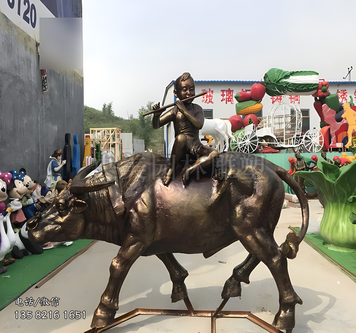 仿銅色玻璃鋼牧童騎牛雕塑